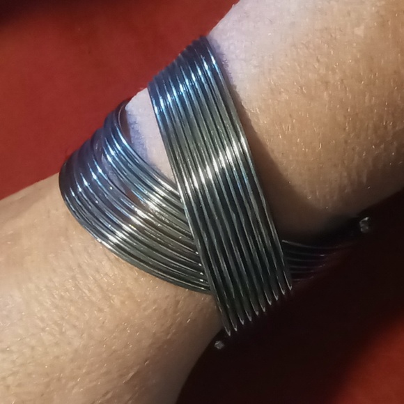 Blackened cuff  adjustable multi layered criss cross pattern. - Picture 2 of 4
